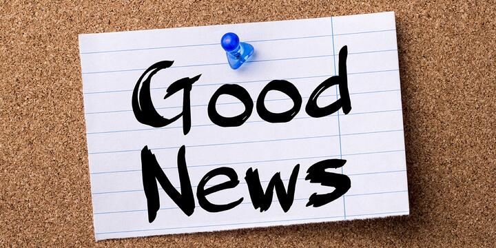 Paper with Good news written on it